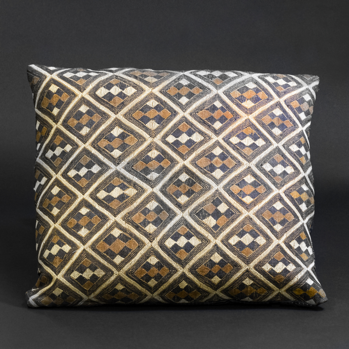 “Chess of the Ancestors” — Kuba Raffia Pillow with Gridded Ikula Motif, D.R. Congo